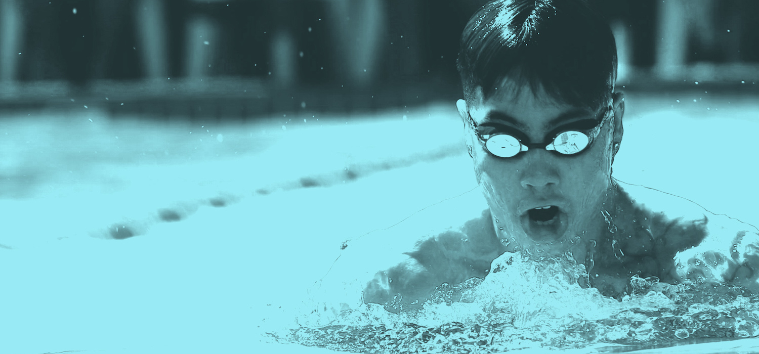 Man swimming in pool