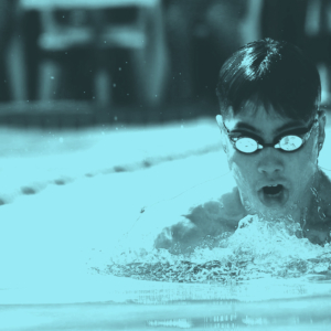 Man swimming in pool